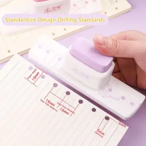 furador de três furos para papel
